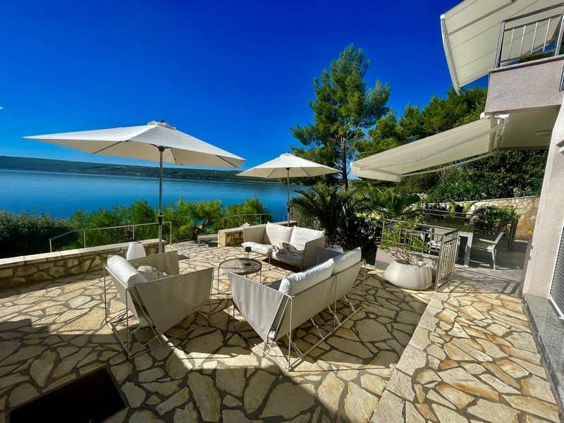 Terrace with lounge furniture and parasols