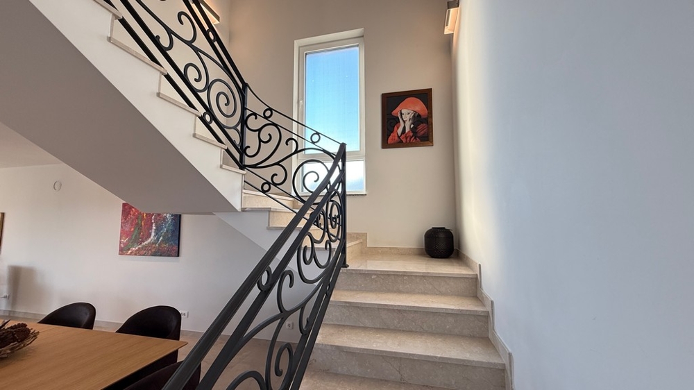 Interior staircase with elegant railing