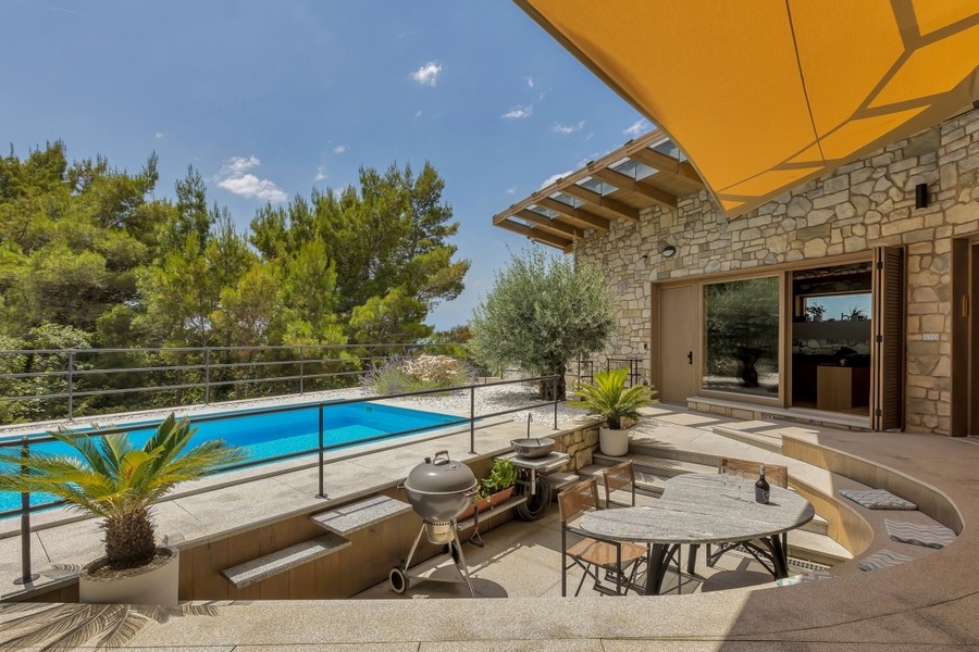 Terrace with pool and Mediterranean plants in Croatia