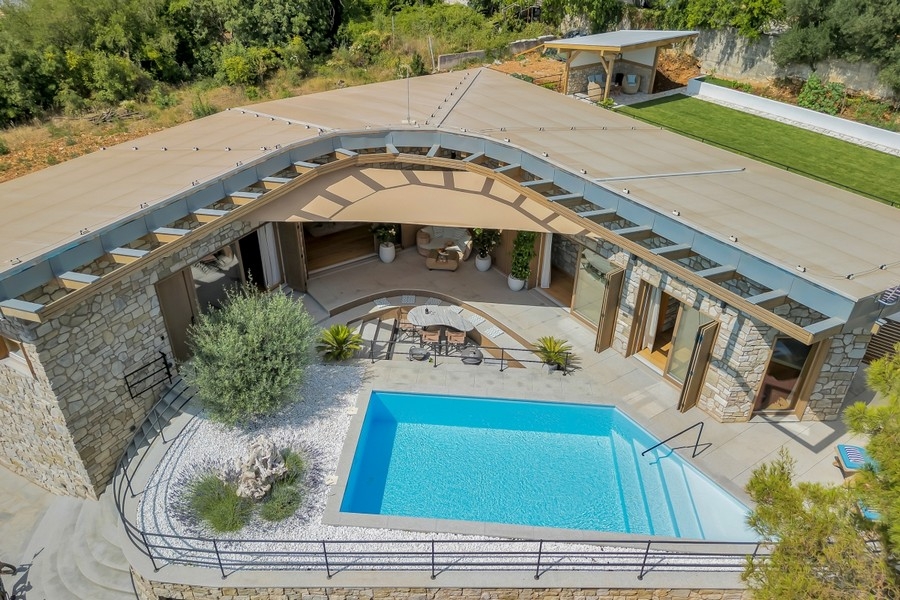 Aerial view of villa with pool and courtyard