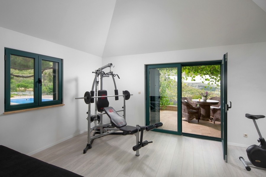 Fitness room with terrace access