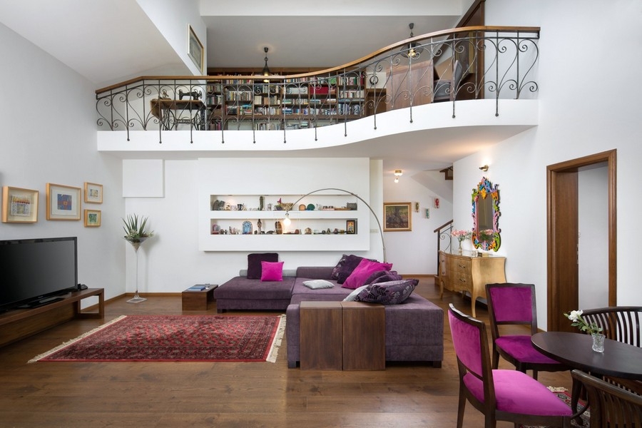 Living room with gallery and bookshelf