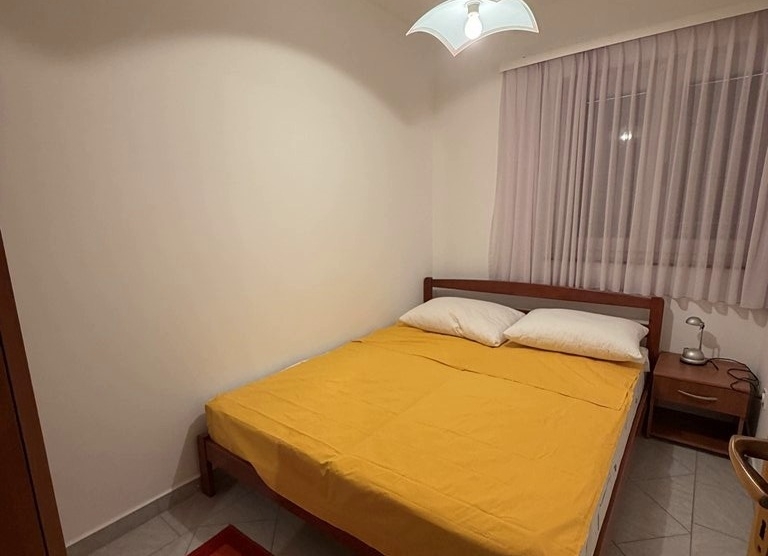 Furnished bedroom with double bed