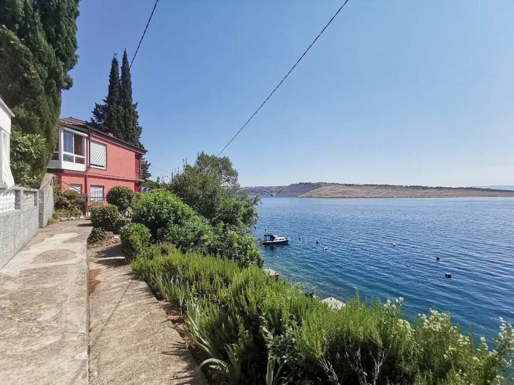 Driveway with garden and sea views