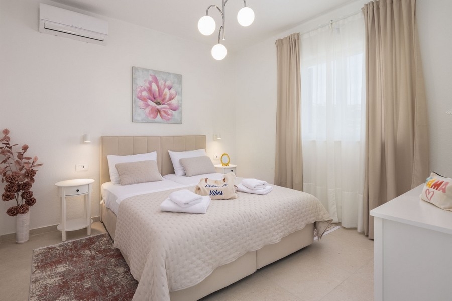 Bright bedroom with double bed