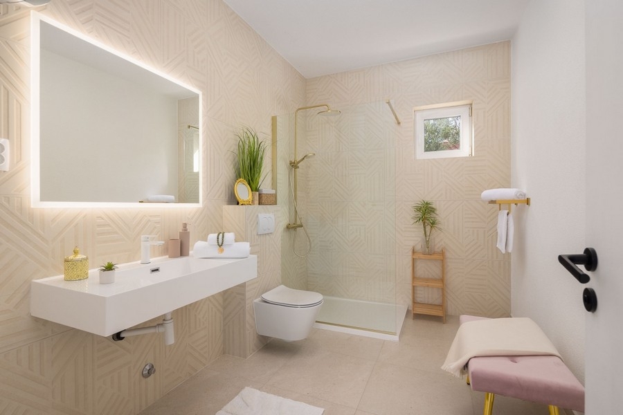Bathroom with shower and double vanity