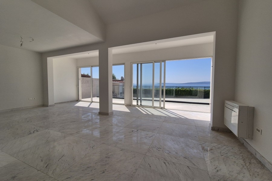 Open living area with access to the terrace