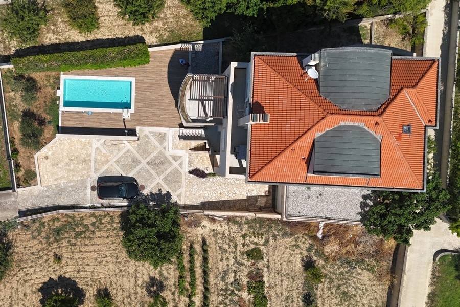 Aerial view of swimming pool and grounds