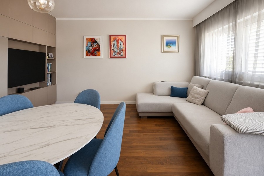 Living room with sofa and dining area