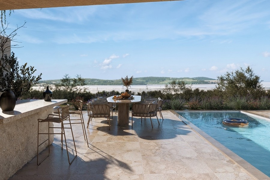 Terrace with seating area by the pool with sea views