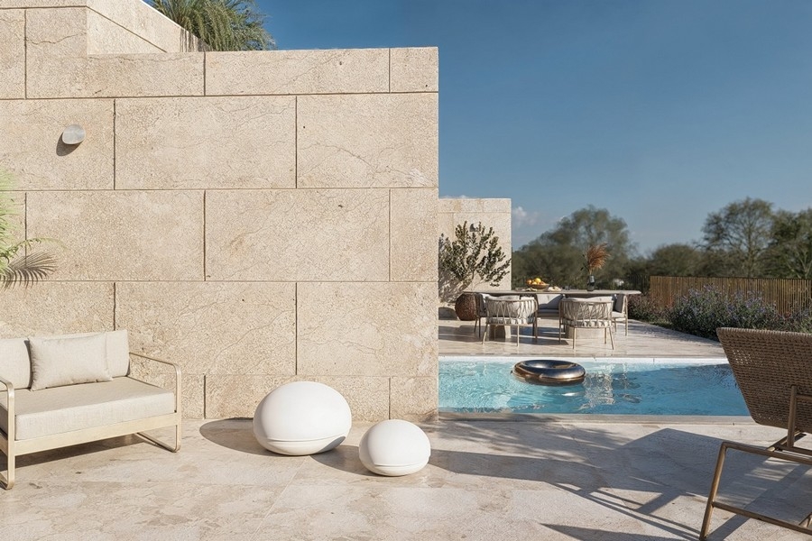 Lounge area on the terrace next to the pool