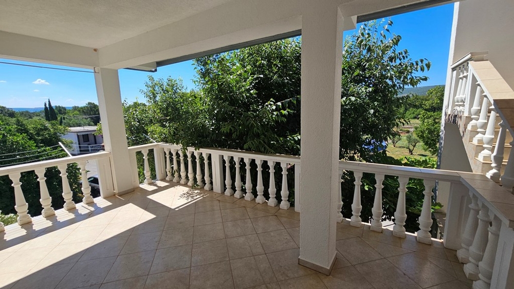 Covered terrace with balustrade