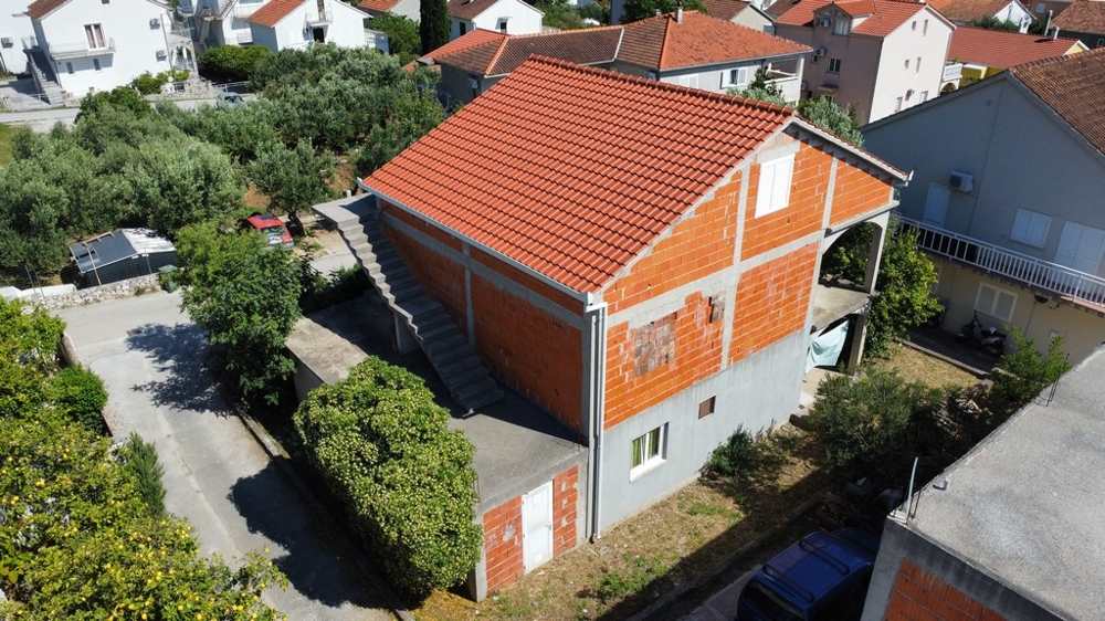 Shell construction with new tiled roof and external stairs in Croatia