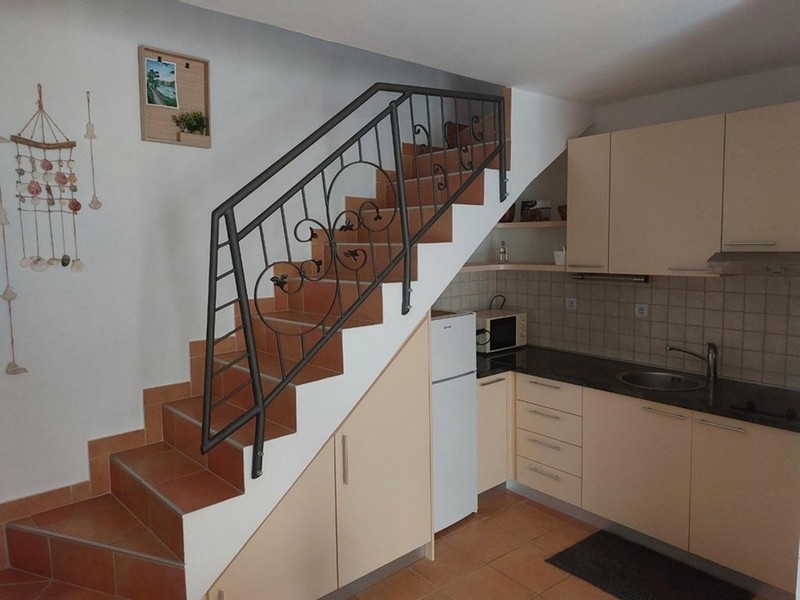 Kitchen with staircase