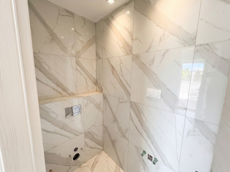 Bathroom with marble tiles