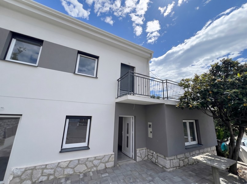 Exterior view of the house with balcony