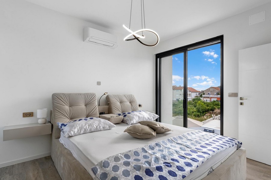 Air-conditioned bedroom with a view.