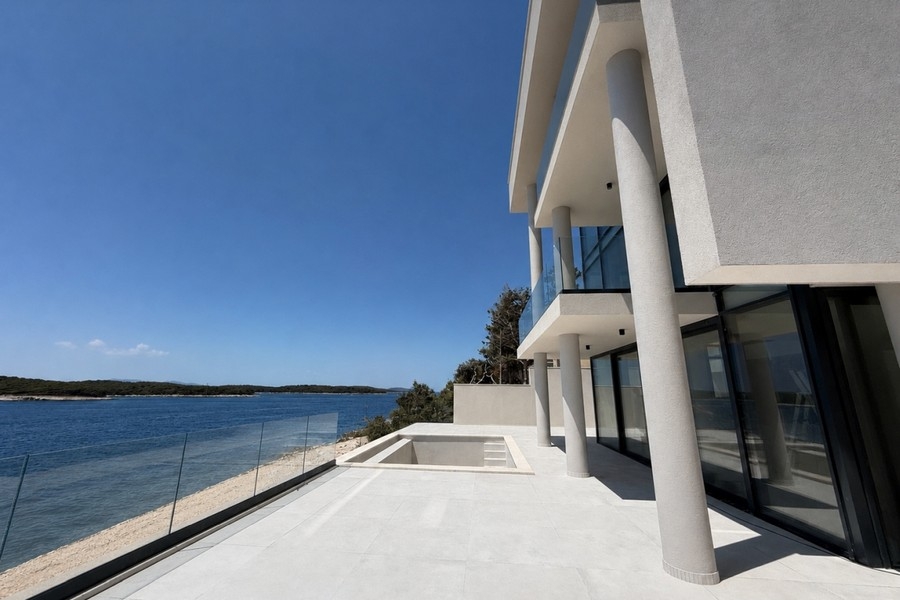 Rooftop terrace with shallow pool and sea views