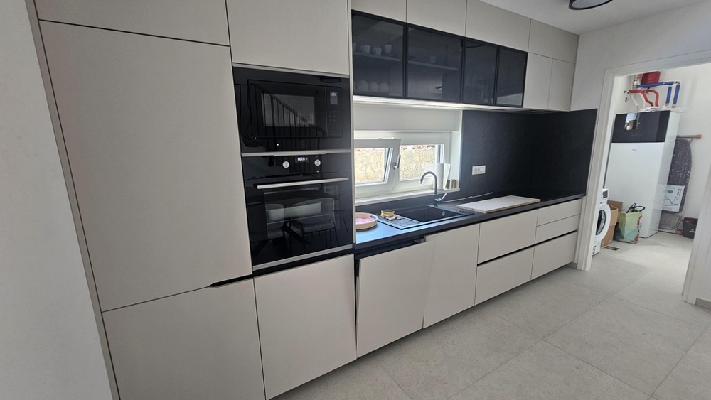 Kitchenette with built-in appliances