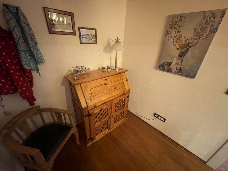 Hallway with wooden secretaire