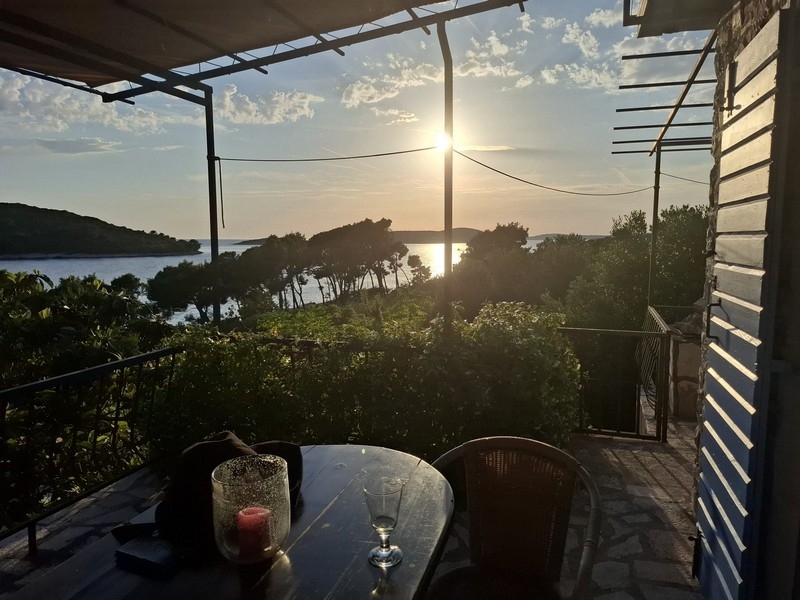 Terrace with sea view at sunset in Sesula