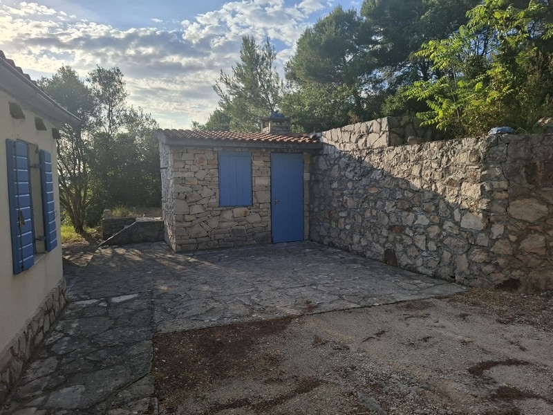 Natural stone outbuilding with inner courtyard on Solta