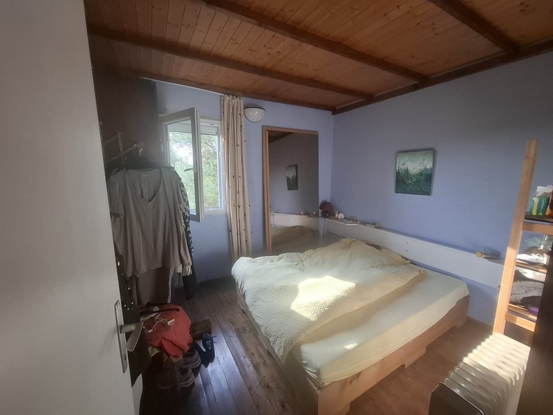 Bedroom with wooden ceiling in house on Solta island