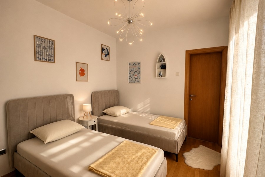 Second bedroom with two single beds