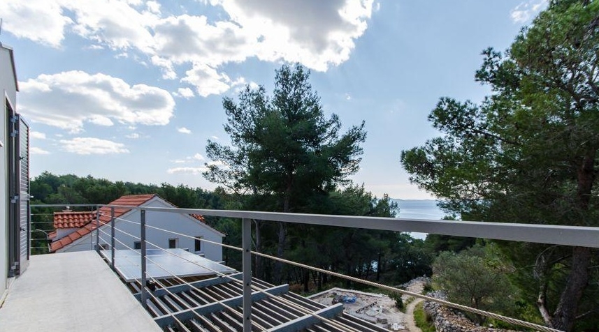 Balcony in the attic overlooking the sea