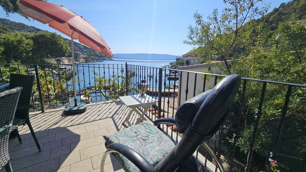 Terrace with seating and water views