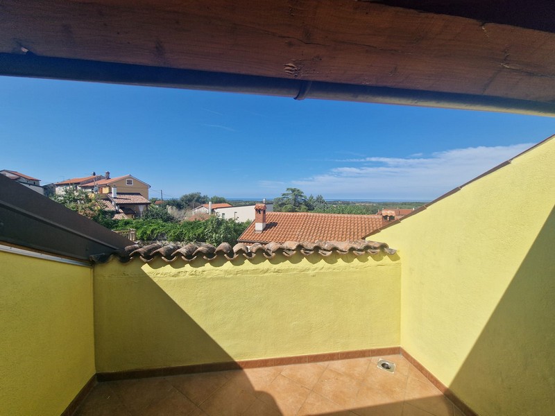 Roof terrace with a view over the roofs of Brtonigla