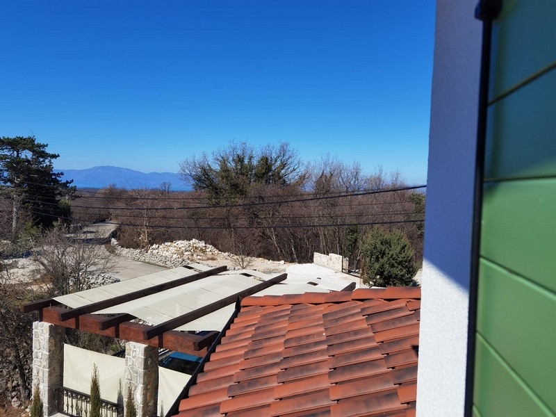 Sea views from the upper floor over the roofs