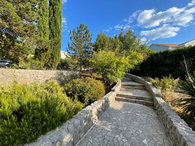 Garden path made of natural stone on the property of the villa