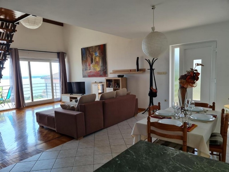 Bright living room with exit to the terrace in Crikvenica