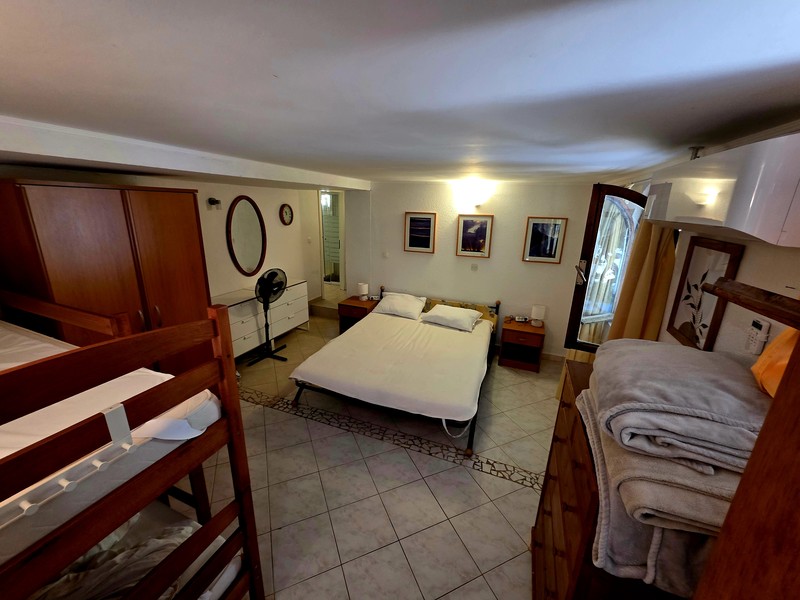 Bedroom with double bed and bunk bed