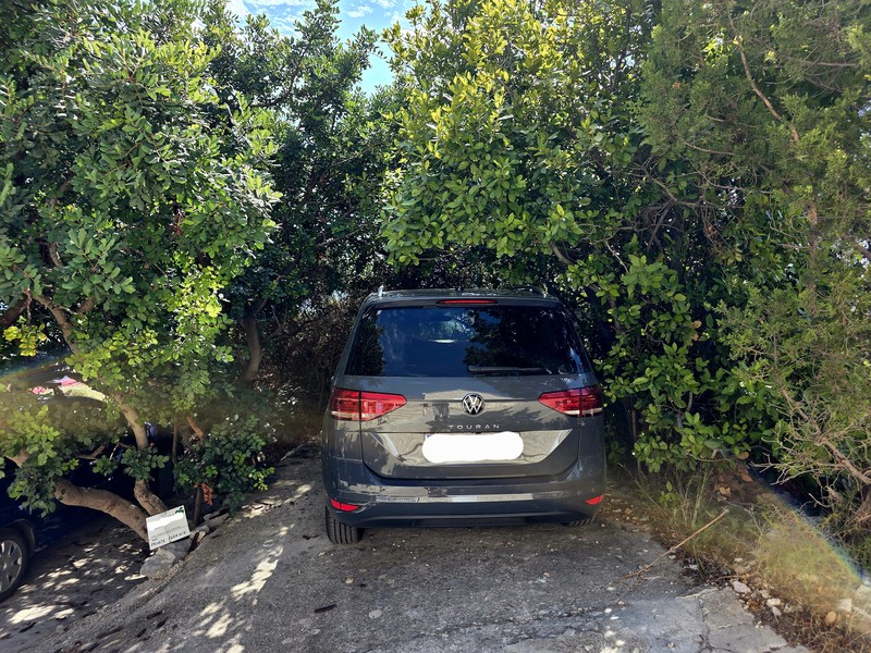 Parking near the house in Podobuce