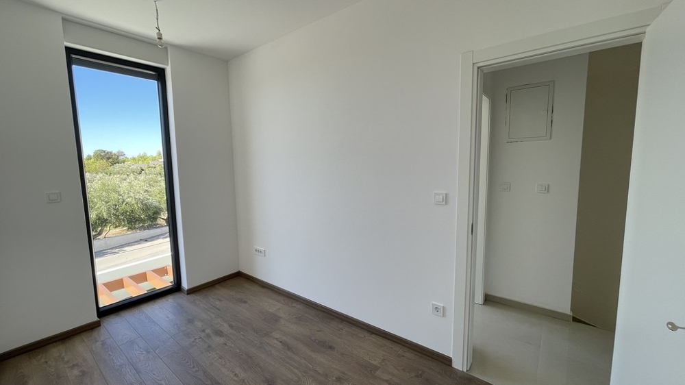Bedroom with French door on the upper floor in Vodice