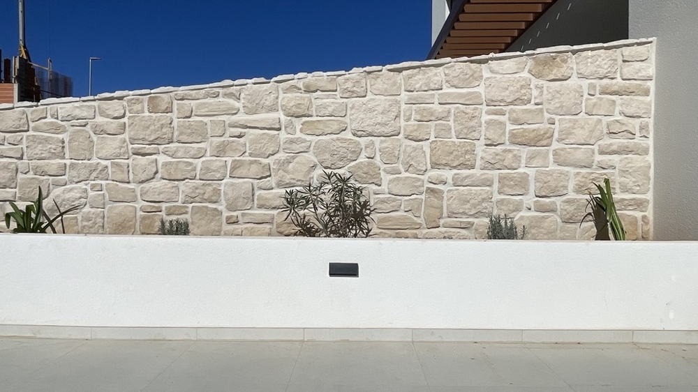 Natural stone wall at the edge of the terrace in Vodice
