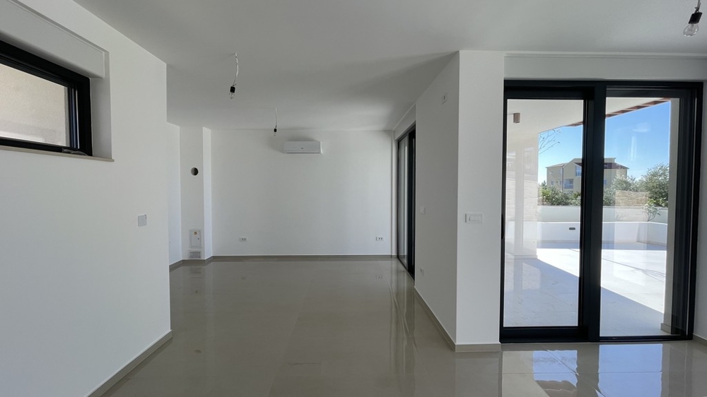 Living area with air conditioning unit on the ground floor in Vodice
