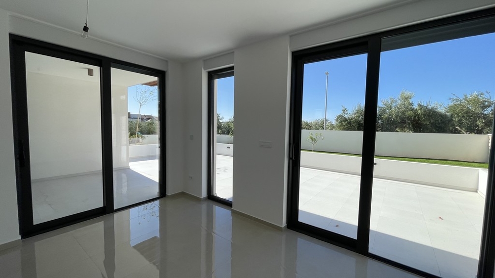 Living room with window front to the terrace in Vodice