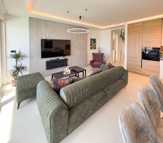 Living area with sofa and television