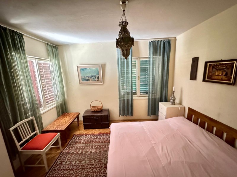 Bedroom with double bed and windows