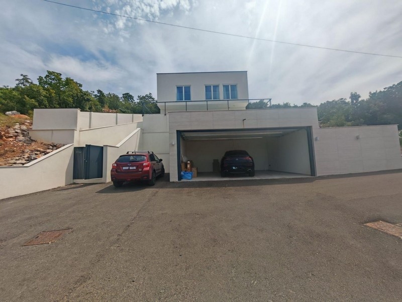 Exterior view of the villa with large garage