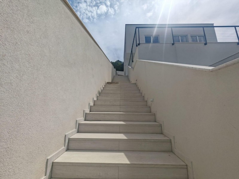 Outdoor staircase along the villa