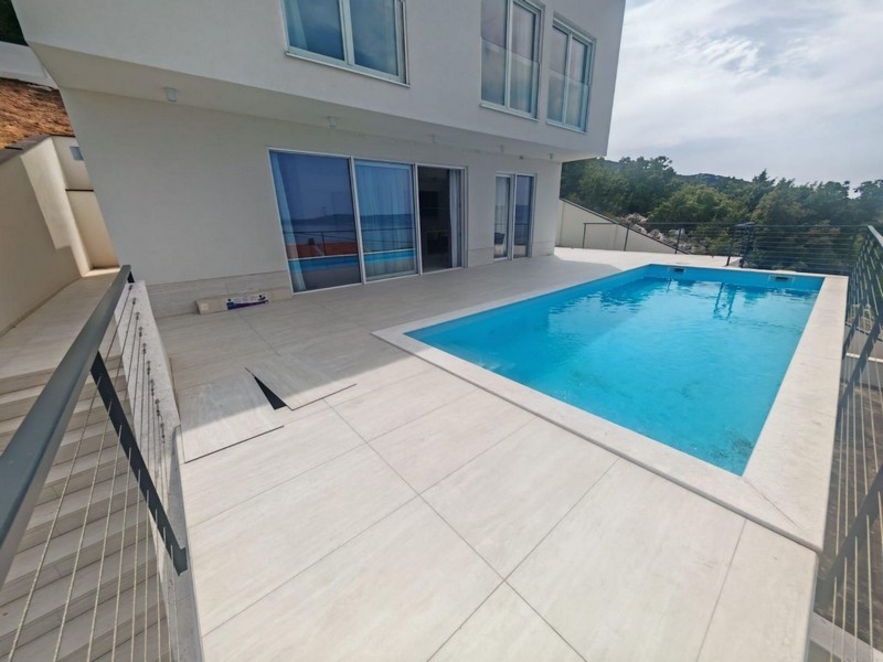 Swimming pool on the terrace in front of the house