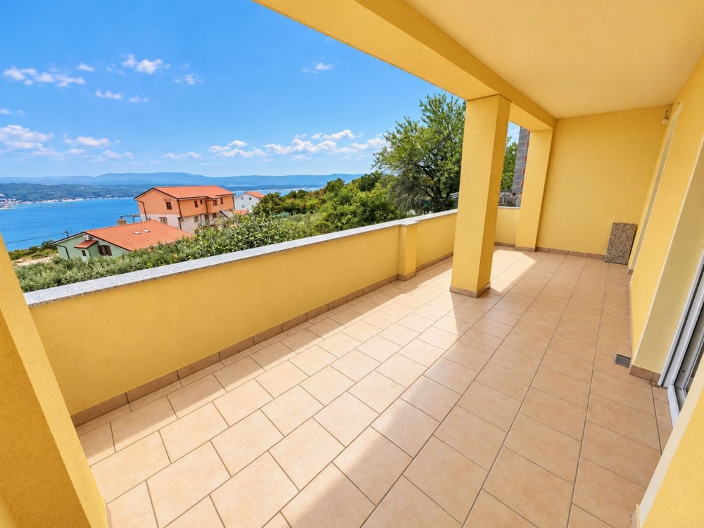 Tiled terrace with sea views