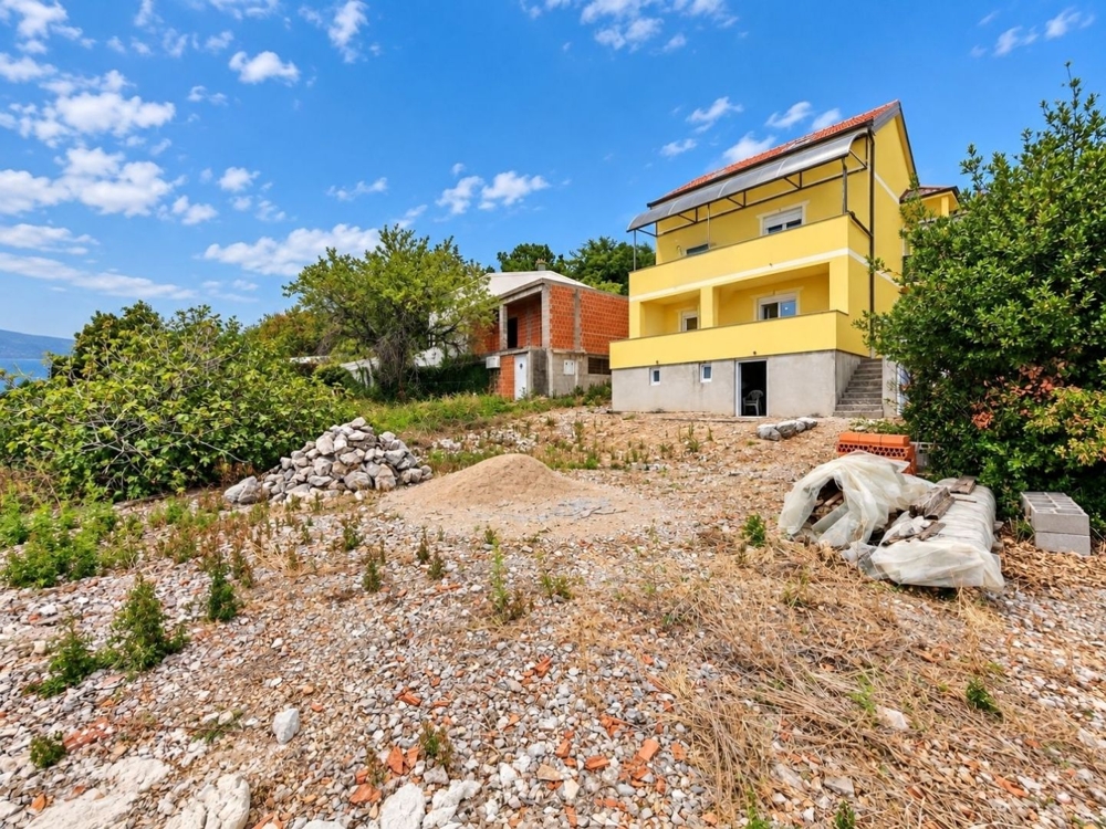 House with land and sea views
