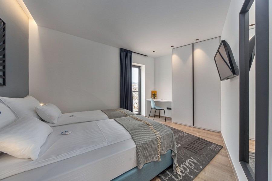 Bright bedroom with built-in wardrobe