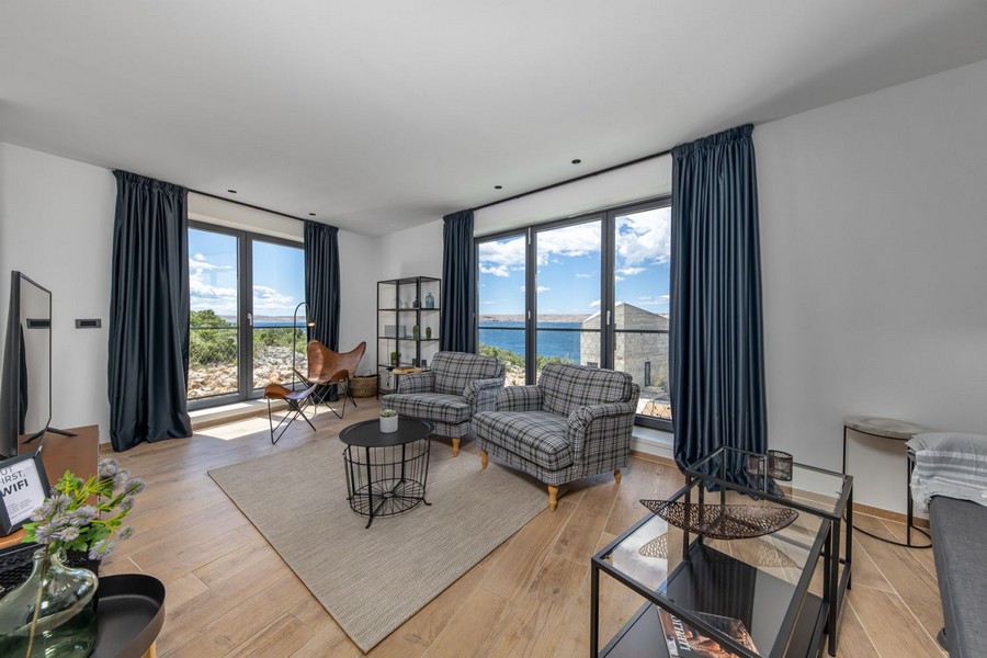 Living room with large windows and sea views