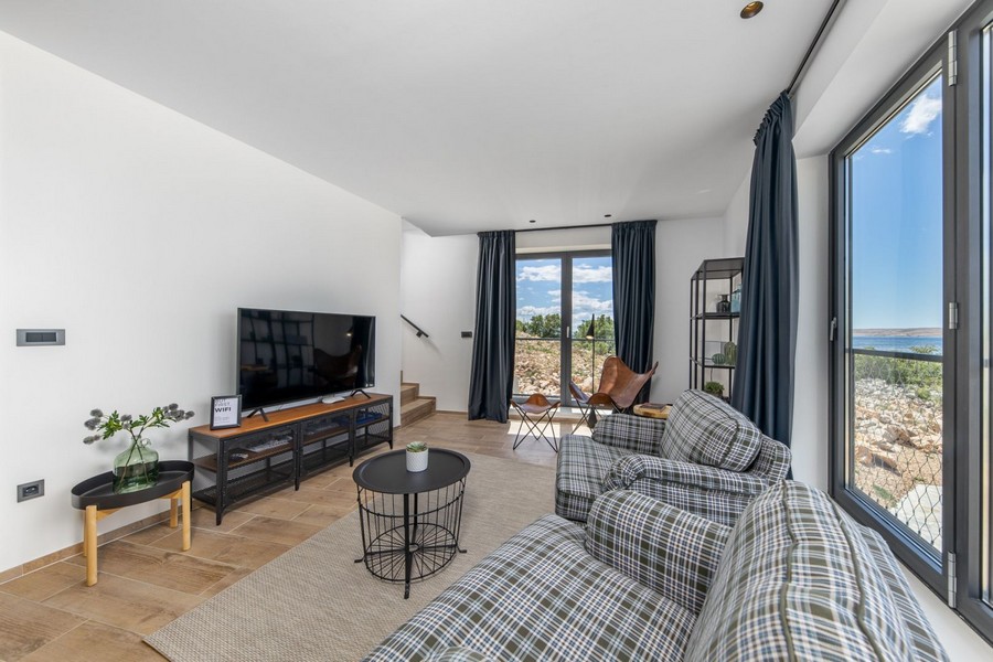 Living area with seating area and television